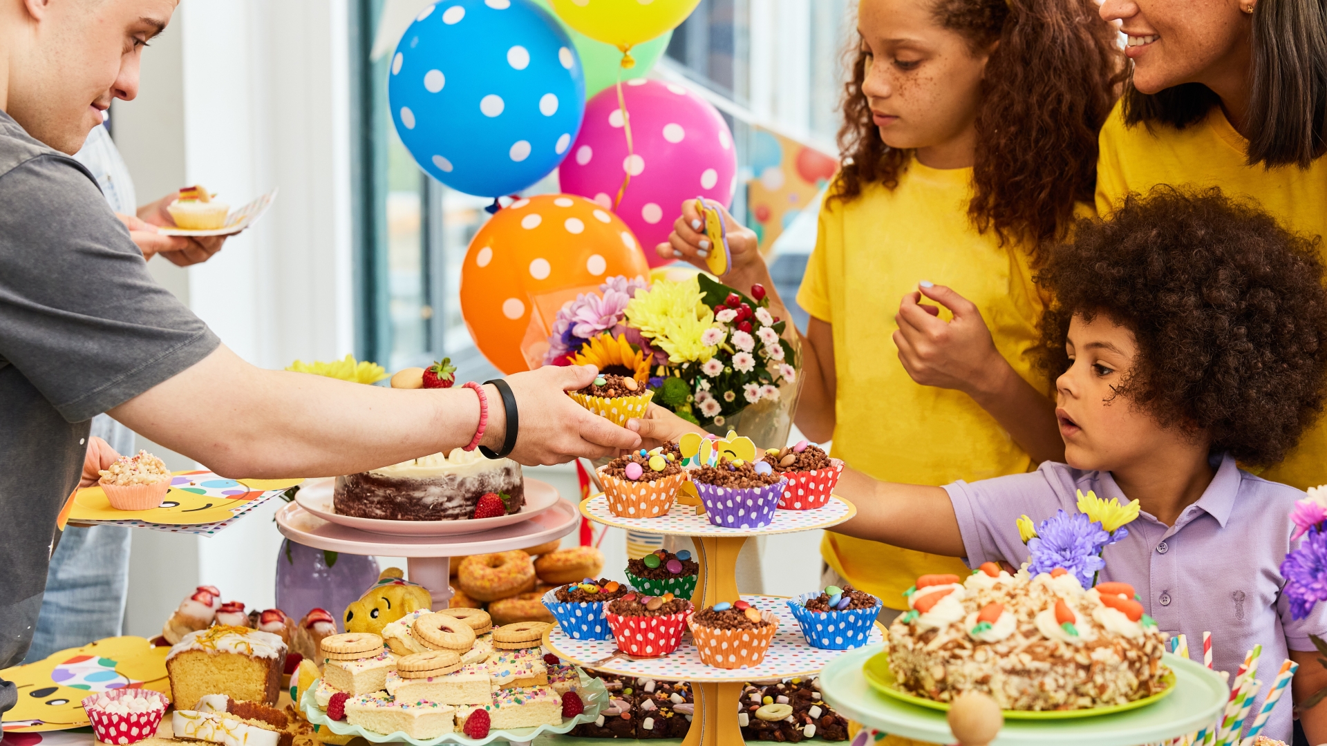 A group of fundraisers hosting a bake sale