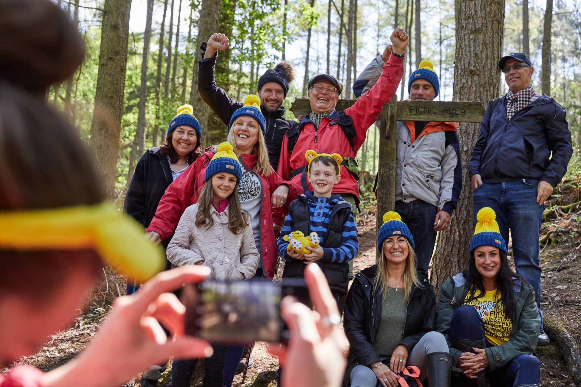 A group photo in the forest