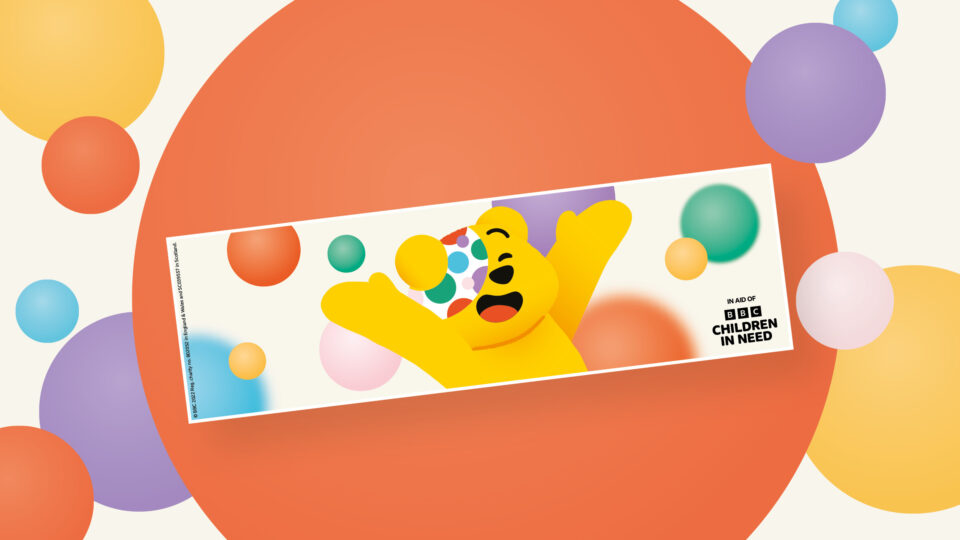 A banner featuring Pudsey Bear and spots, to be used on a collection tin