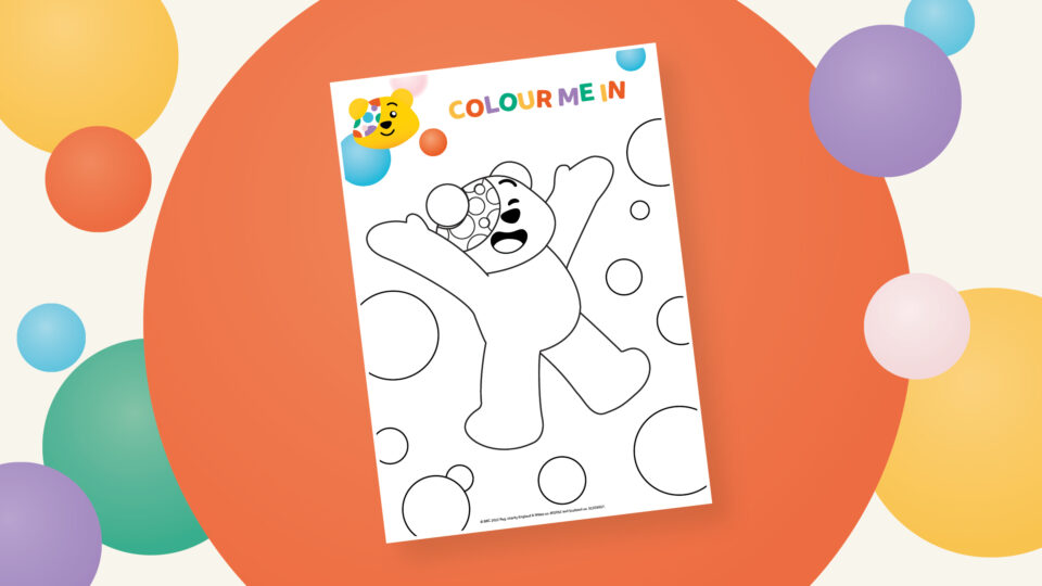 Pudsey Colouring Sheet on spotty background