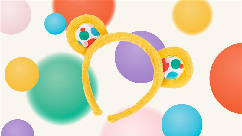 Pudsey ears on a spotty background